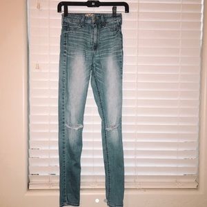 High waisted, distressed light wash skinny jeans